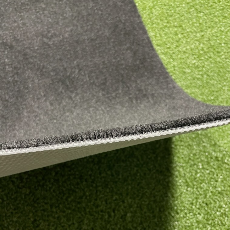 A sample swatch of Big Moss V2 Midnight Shadow Black Putting Turf.