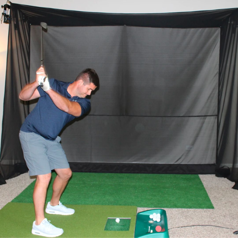 G-TRAK Retractable Net with golfer.