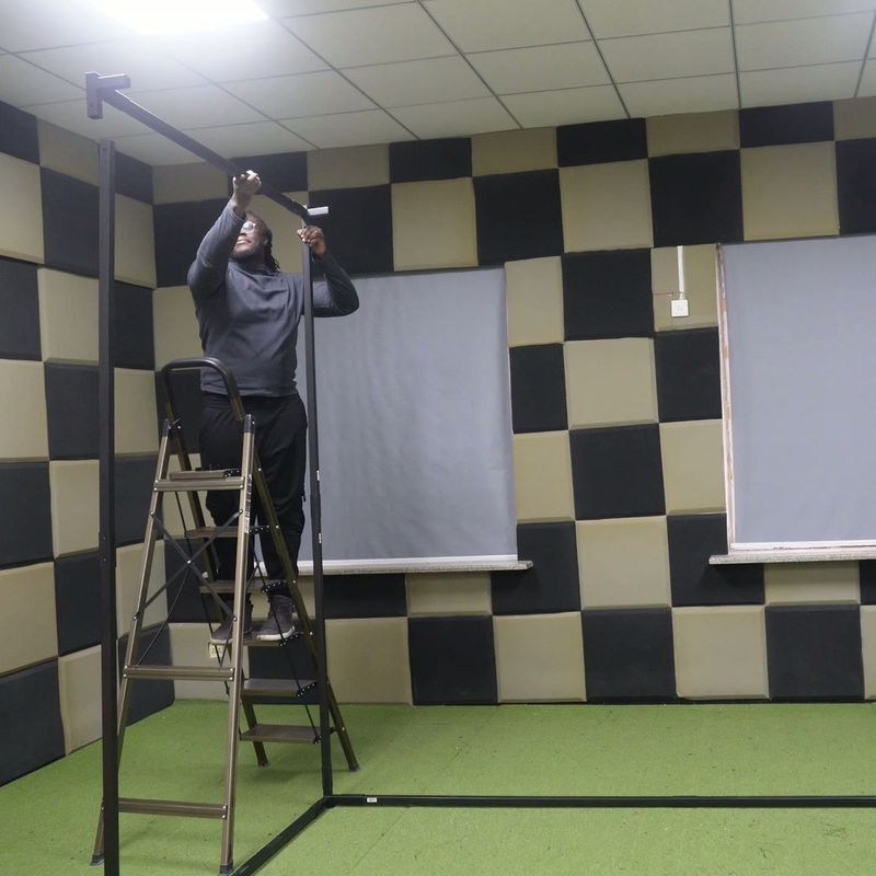 Impact Sports Premium Square Pole Golf Simulator Enclosure steel square pole frame during assembly.