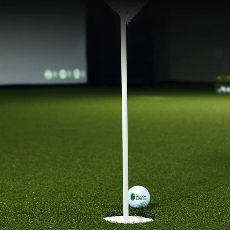 Money Putt Golf Turf with cup and golf ball.