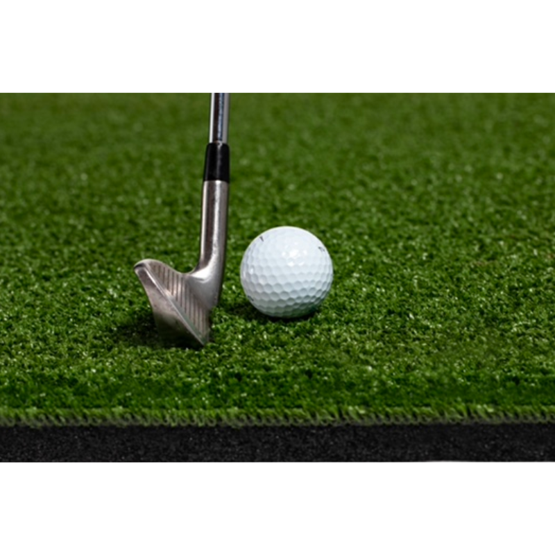 Monster Mat Golf Mat 2.0 with golf club and ball.