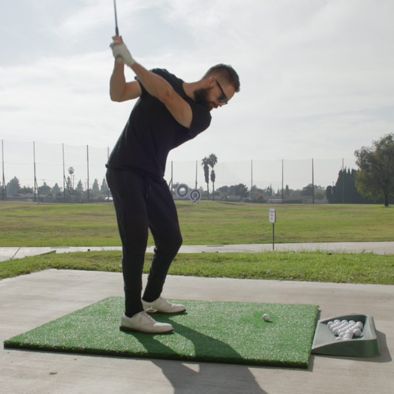 Monster Mat Golf Mat 2.0 with golfer backswing.
