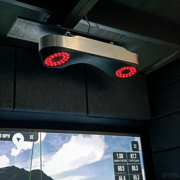 ProTee VX United Launch Monitor being used in a golf simulator room.