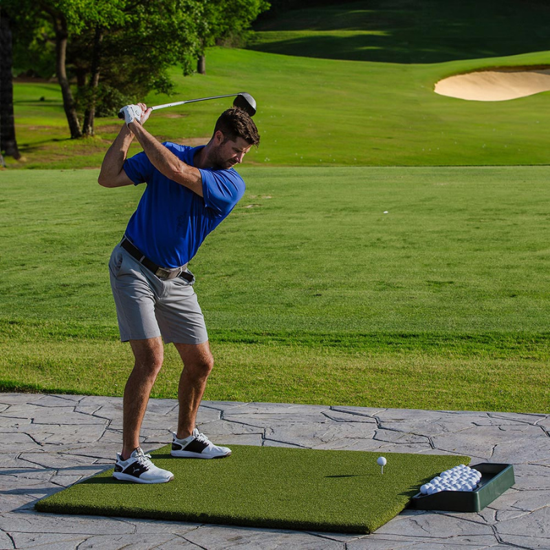 Real Feel Country Club Elite Golf Mat 4x5 foot with golfer hitting driver.