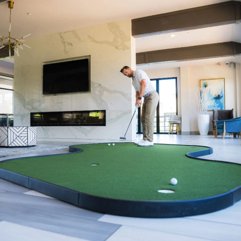 SIGPRO Double Break Putting Green golfer putting.