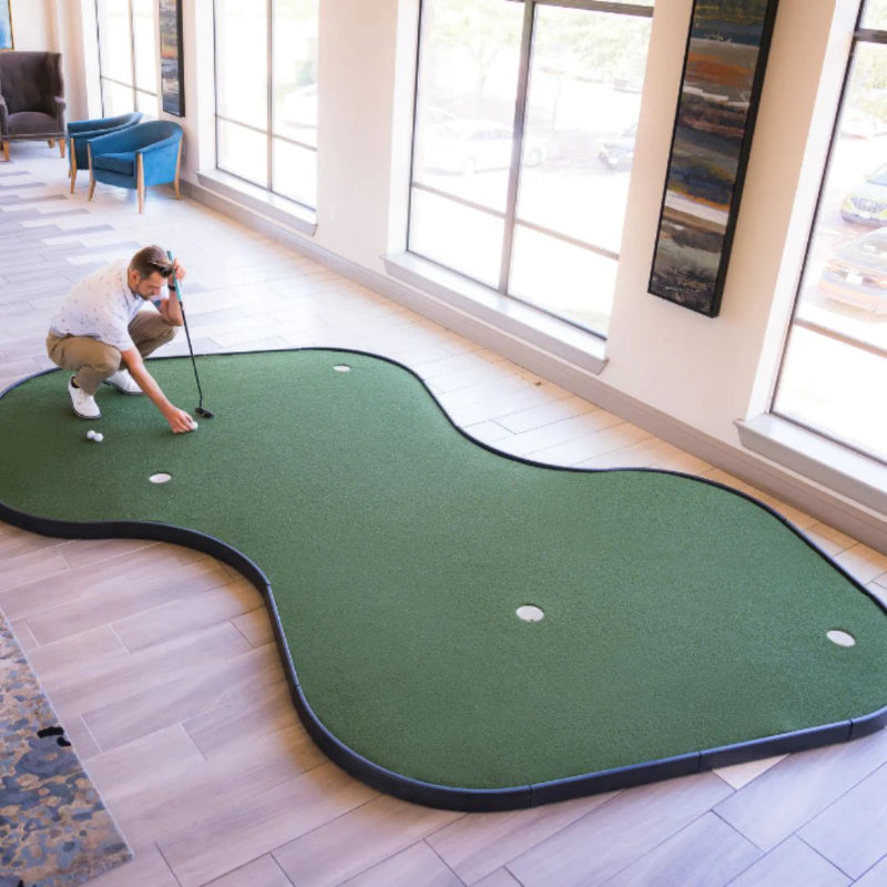 SIGPRO Double Break Putting Green lining up.