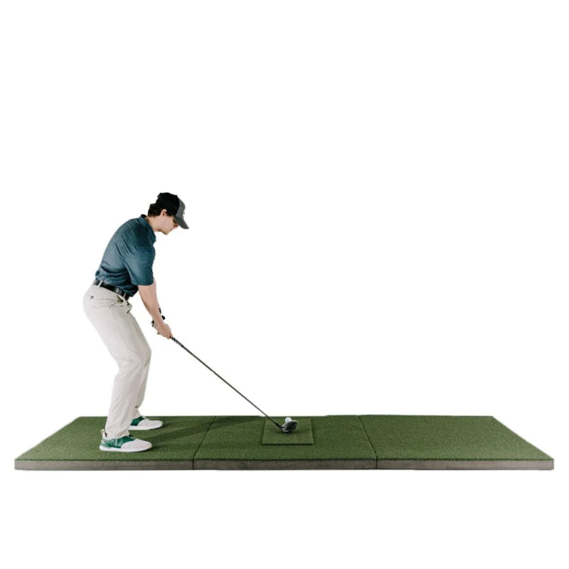 SIGPRO Softy 4 x 10 Golf Mat man teeing up.