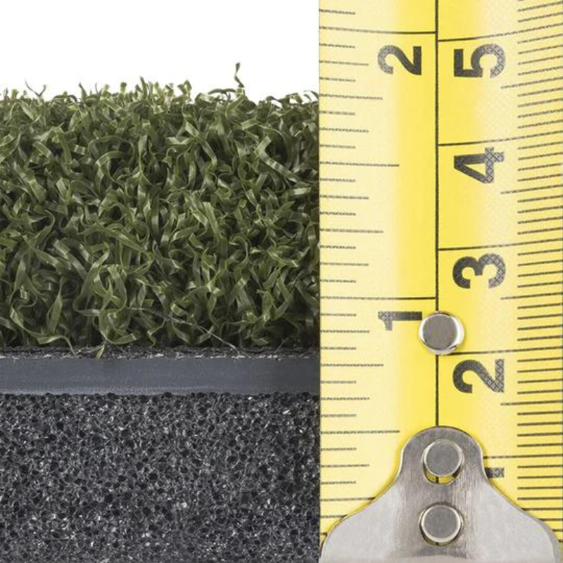 Spornia ProStrike Commercial Golf Mat with measuring tape.