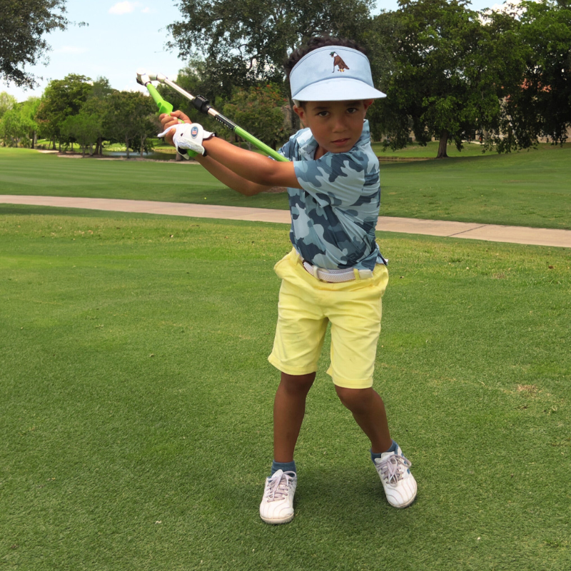 Sure-Strike Jr. by Sure Golf Training Aid with golfer in backswing.