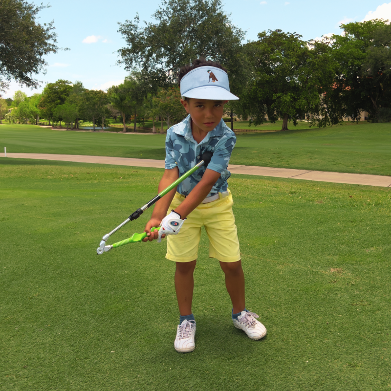 Sure-Strike Jr. by Sure Golf Training Aid with golfer in takeaway.
