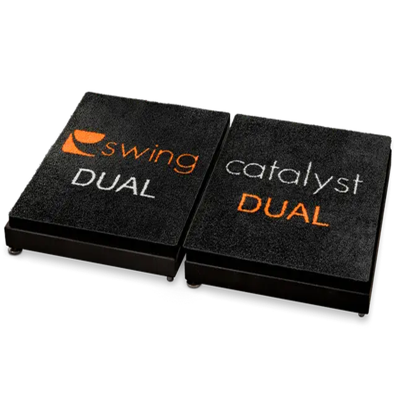 Swing Catalyst Dual Motion Plate with an angled view of the black platform showing orange and white text.