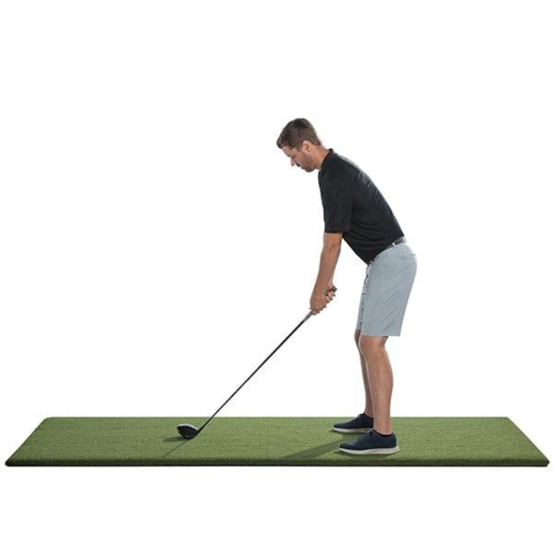SwingTurf Golf Hitting Mat 4' x 9' with left handed golfer.