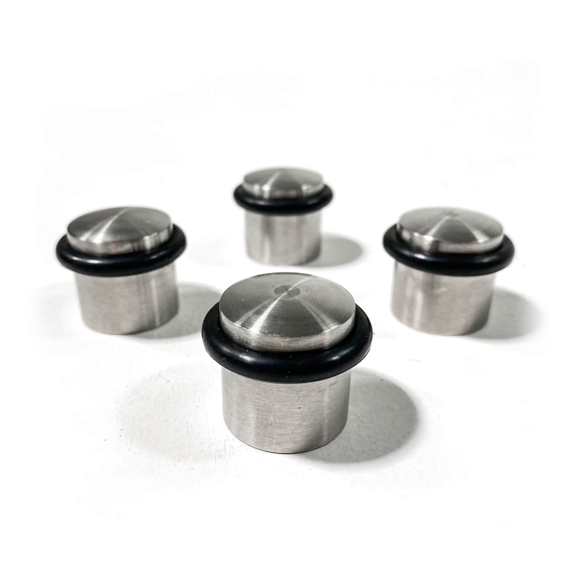 Set of four stainless steel gate drill weights.