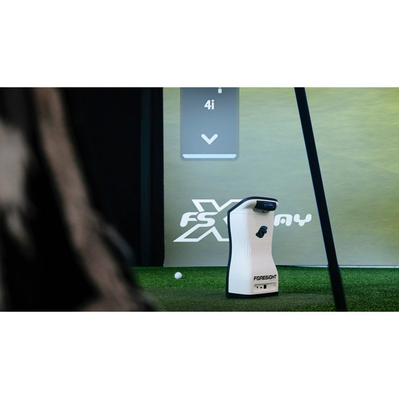 Golfer using the Foresight Sports QuadMAX Launch Monitor